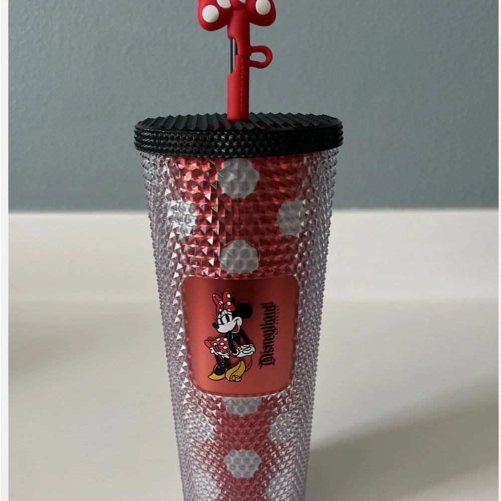 Disney Red and Black Minnie Mouse Tumbler still has the papers in it